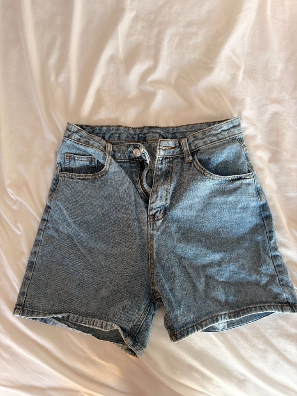 Light blue denim shorts